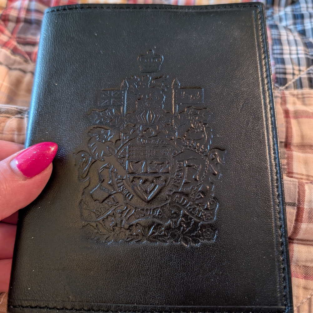 Black Embossed Leather Passport Holder